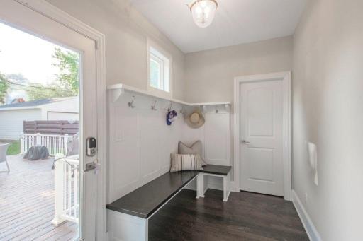 Mud room, drop area with closet located just inside the back door.