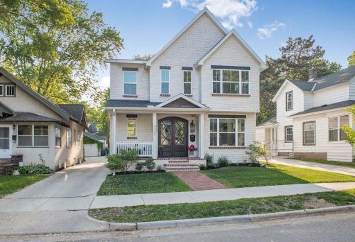 Elegance abounds in this Linden Hills gem. A red brick walkway leads to the relaxing front porch and stunning double door entry.