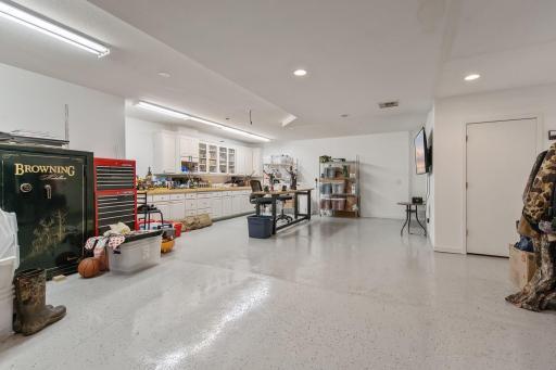 The WOW workshop area. Has an entrance in to the lower level of the home and also stairs to the main floor 3 car garage.