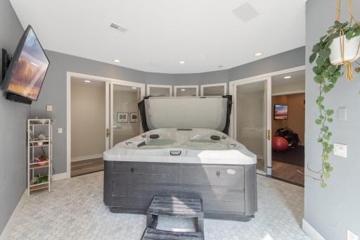 Jacuzzi room has new tile. Exercise room across the hall.
