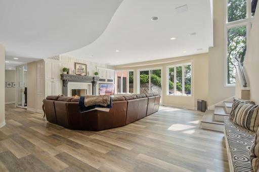 Built in entertainment area and gas burning fireplace. Glass door leads you out to the pool and patio area.