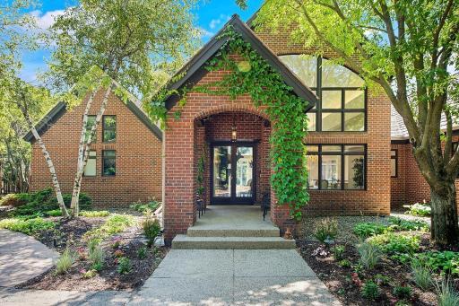 Dramatic entrance and full brick exterior.