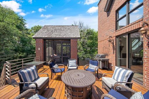 Ultimate outdoor living space with a screened in porch.