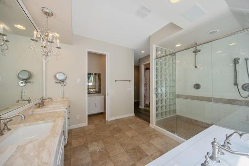 Another view showing the separate water closet and walk in closet entrance.