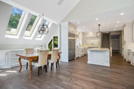 Home is filled with custom design features such as the windows in the dining area.