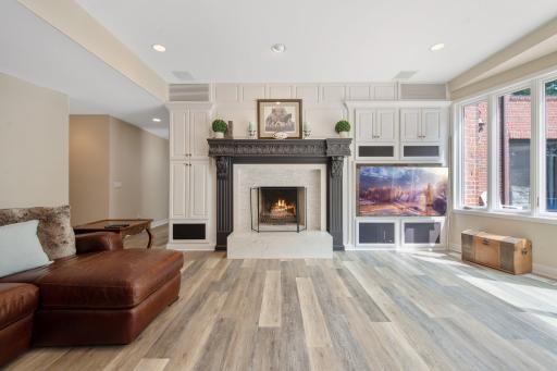 Refreshed gas burning fireplace with stack stone.