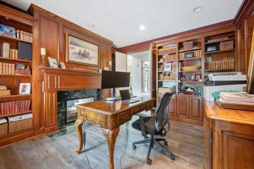 Main floor office/den has a 2 sided fireplace to the living room.