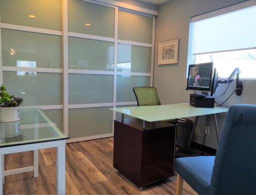 Back wall consists of movable doors with a storage area the entire length of the wall. Doors have also been used as a writing surface with dry erase markers for idea sharing sessions