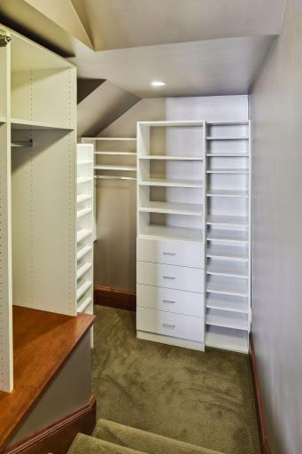The private owner's suite features a step down walk-in closet.