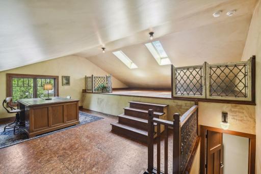 The upper bonus room is the perfect space for a kid's playroom, a craft room, an artist's studio or media room.