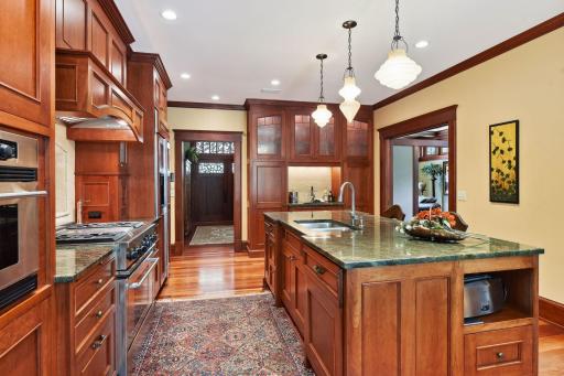 An abundance of kitchen lighting includes recessed, pendant, in-cabinet and under-cabinet.