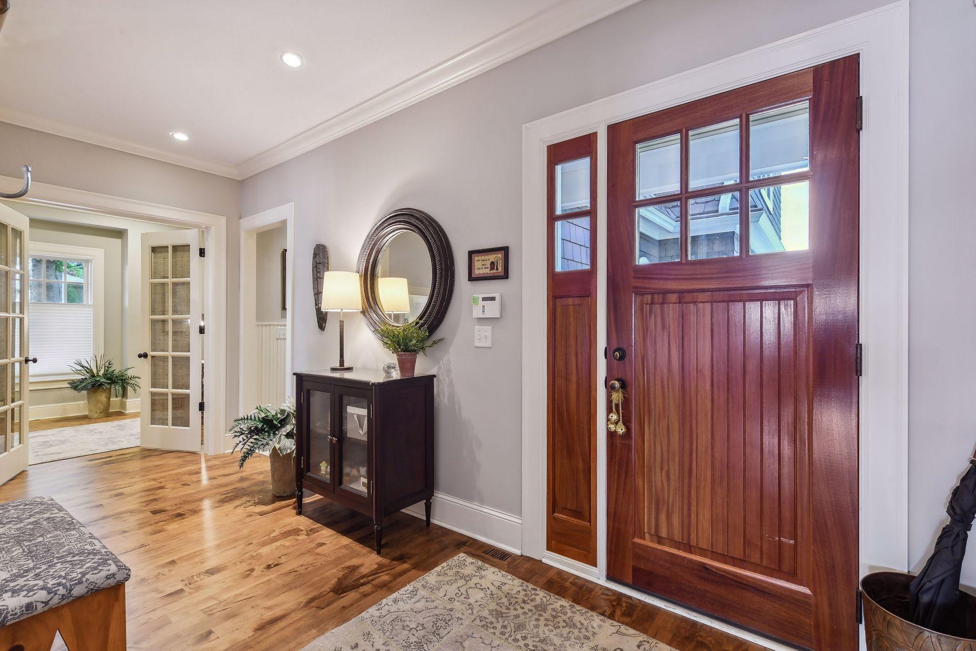 Offering character and charm, the home features enameled crown molding and custom millwork throughout.