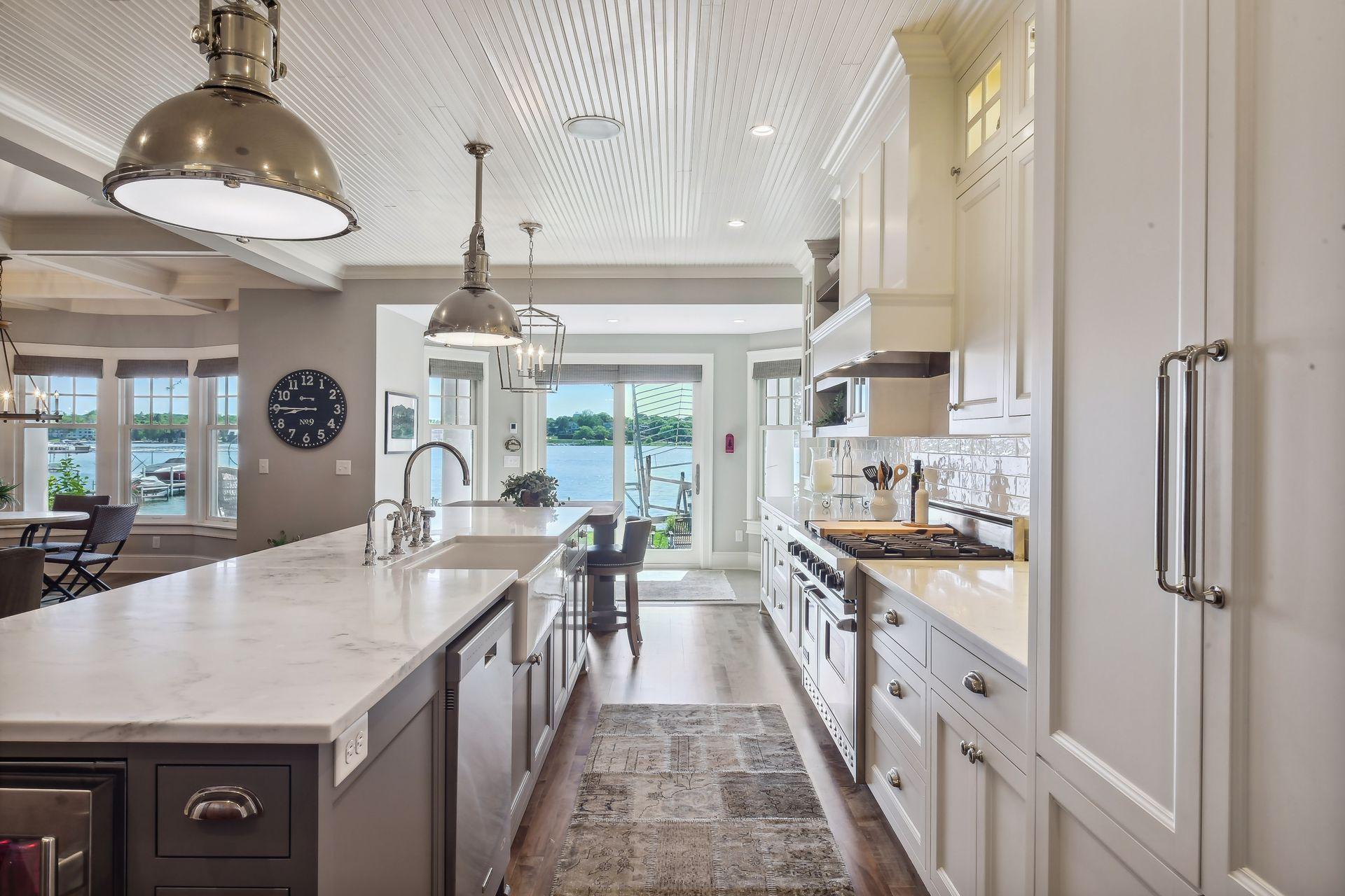 Every room of the home enjoys commanding lake views.