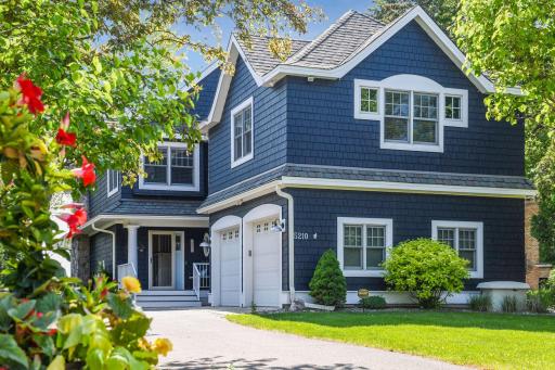 Beautifully refreshed from pillar to post, this custom home brings a little bit of the Hamptons to the shores of Lake Minnetonka.