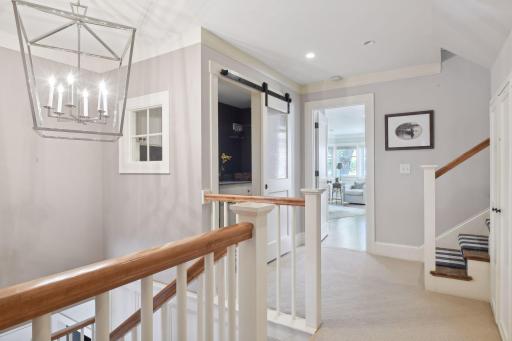 At the top of the staircase to the second floor is the convenient Laundry Room.