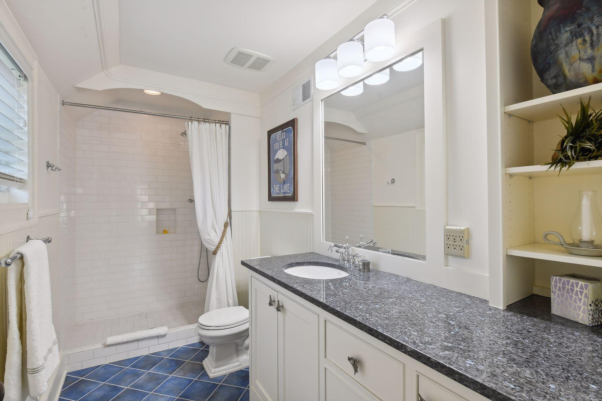The Junior Suite enjoys this private 3/4 bathroom.