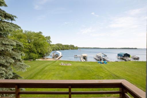 Spacious and flat backyard of manicured lawn.