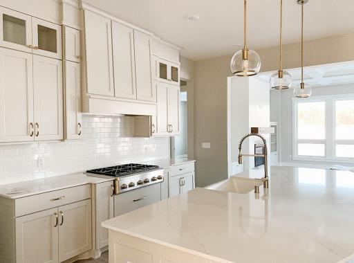 Photo of a similar home from another community-colors and selections will vary