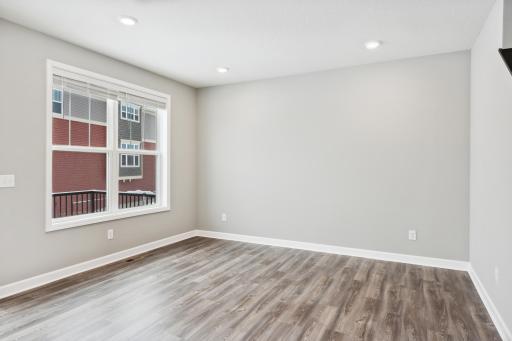 Extension of the kitchen for additional gathering space. Photos are not of actual home. Actual home will be similar. Some colors and features may vary.