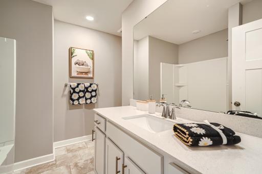 2nd Floor Bathroom- Model home pictured with the same floorplan.