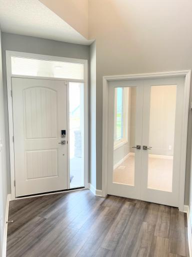 Welcome home! The spacious front entry features leads you to the front office or into the Family Room. Photos are of the actual home.