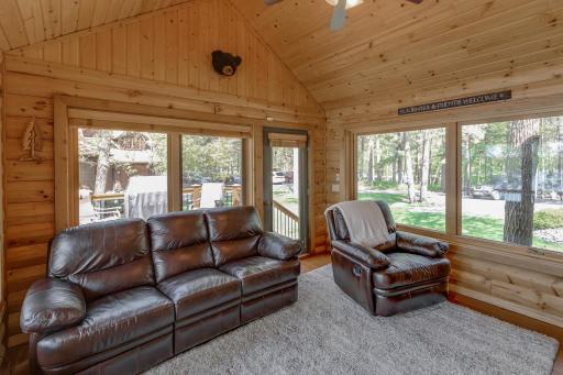 Natural wood interiors and surrounded by windows to let the natural light in!