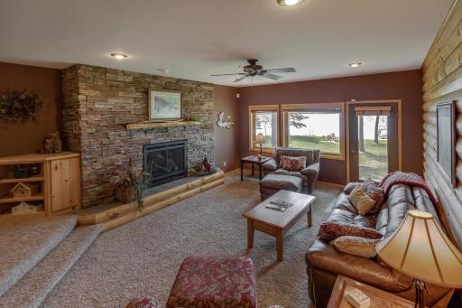 Beautiful stone fireplace in the lakeside family room!