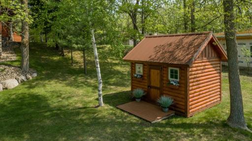 Cute and charming lakeside storage shed.