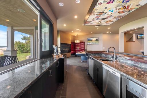 Beer coolers, convection microwave, dishwasher, ice maker and beverage chiller all part of the bar