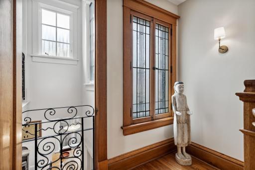 Landing opens up to the kitchen and lets in extra natural light in both spaces.