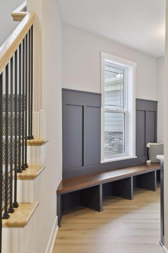 Mudroom with decorative paneling