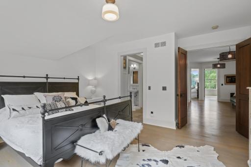 The ceilings of the owner's suite are angled high, giving the room an open and airy feel.