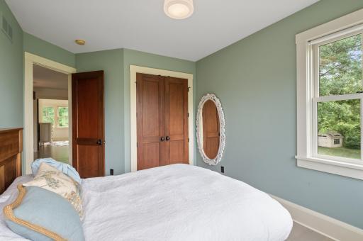 The bedroom includes a spacious double door closet, providing ample storage for clothing, accessories, and other personal belongings.