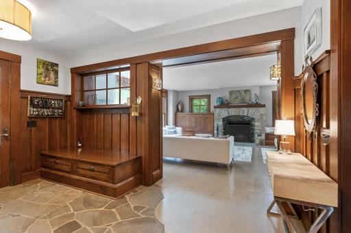 This spacious entryway is an inviting and grand area that serves as the first impression of the home