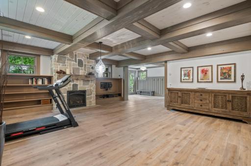 The family room offers ample built-in storage options. These storage units can be used to store books, entertainment devices, board games, and other items, helping to keep the room organized and clutter-free.