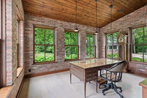 The office's large windows provide captivating views that offer a visually pleasing backdrop and can serve as a source of inspiration and tranquility.