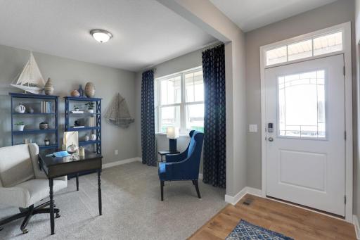 As you enter this beautiful home, the flex room is what you will see first! The natural lighting will make it difficult to stay focused if you choose this as an office! MODEL HOME PHOTOS, COLORS AND SELECTIONS WILL VARY.