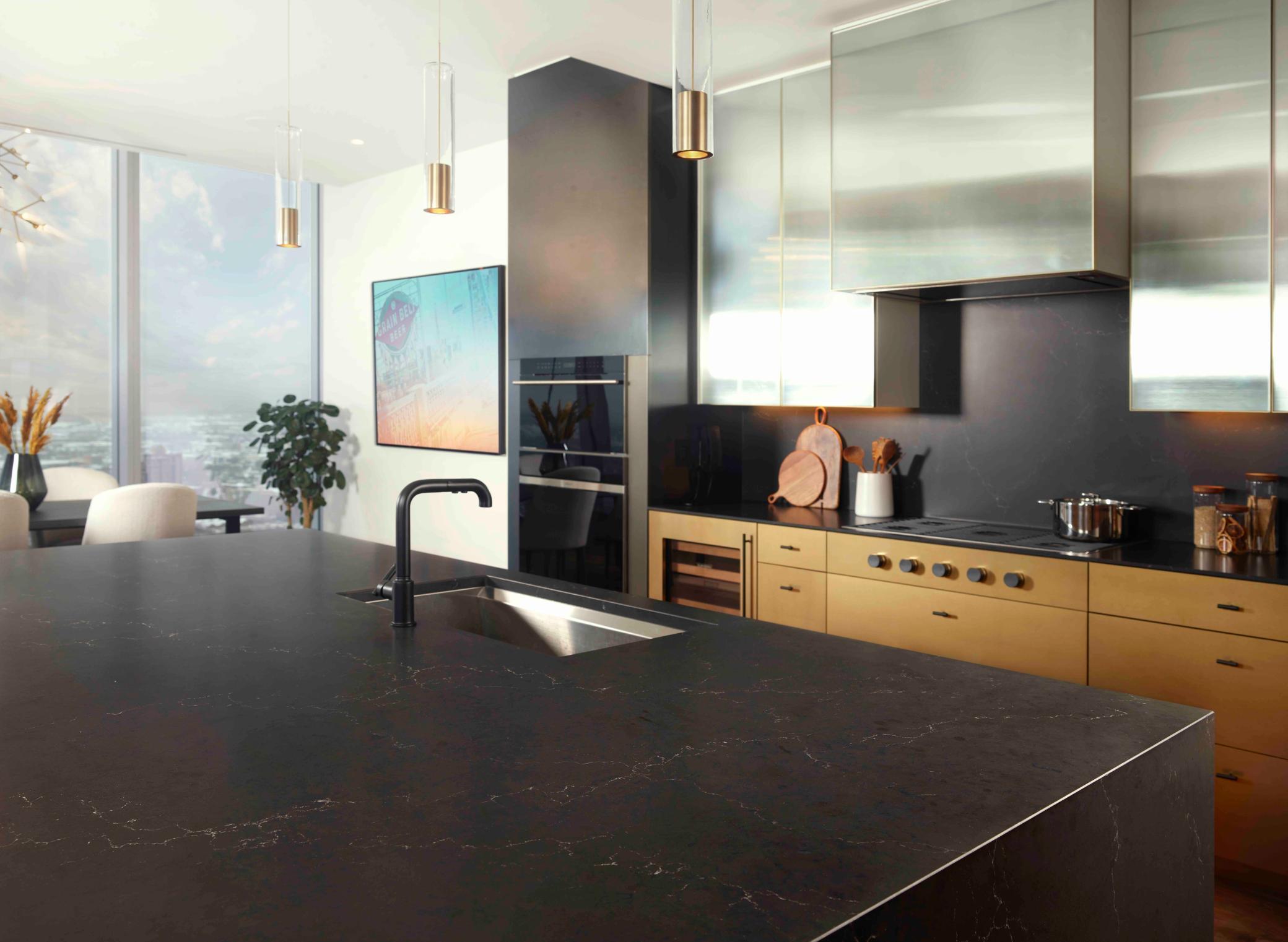 Modern Urban finish palette includes Cambria waterfall countertop, walnut wide plank flooring & trim. Photos courtesy of Cambria.