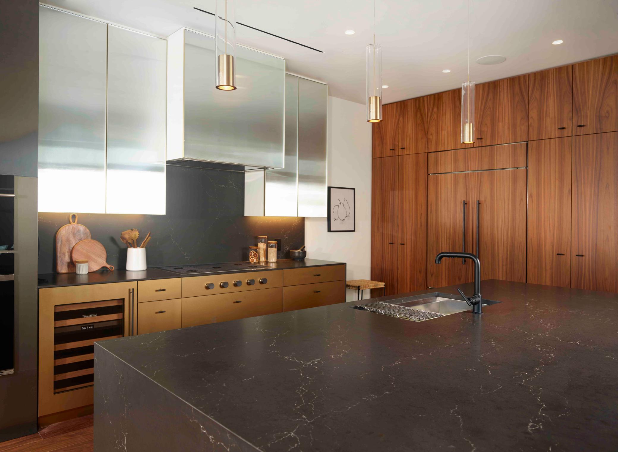 Modern Urban finish palette includes Cambria waterfall countertop, walnut wide plank flooring & trim. Photos courtesy of Cambria.