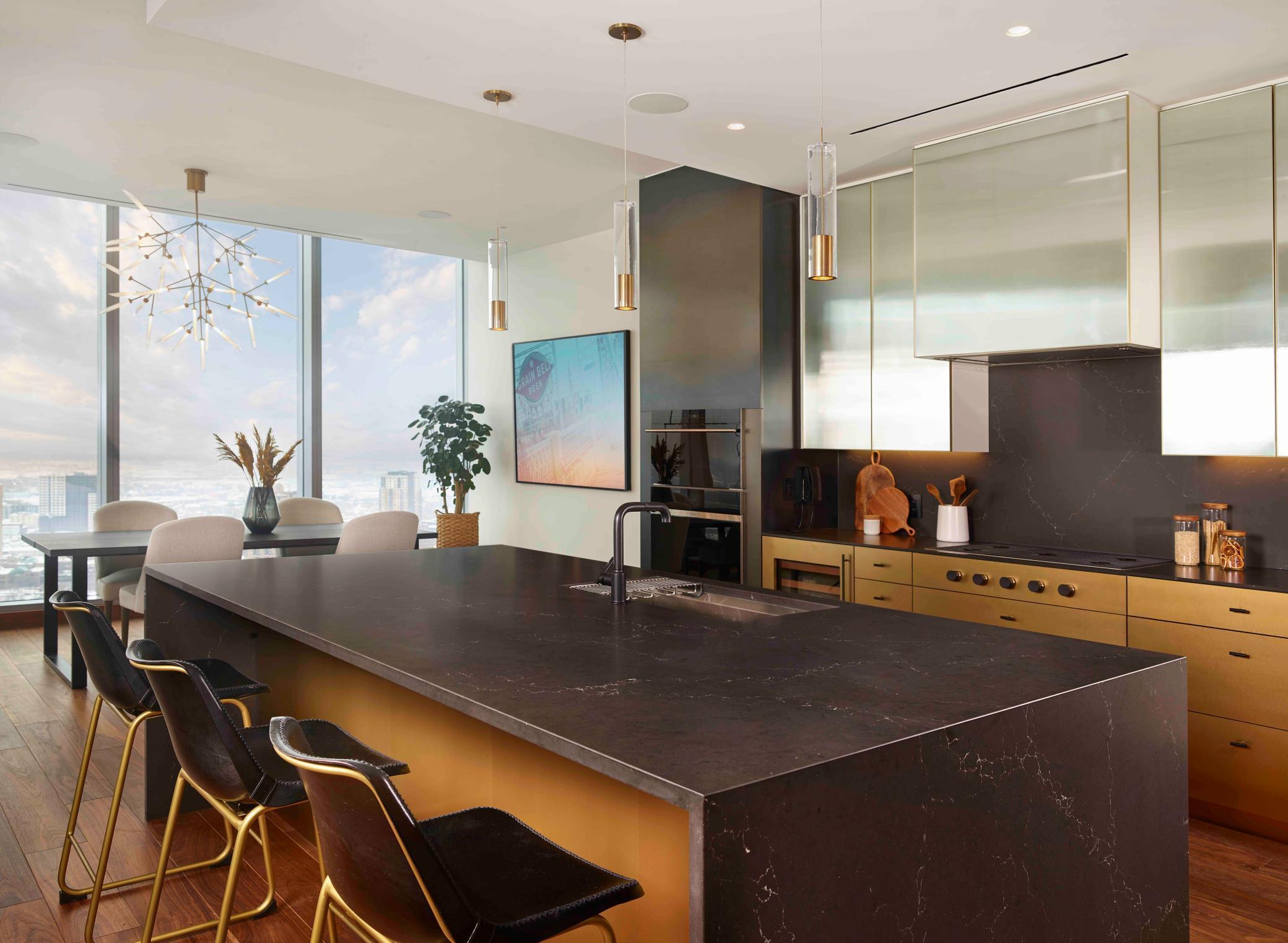 Modern Urban finish palette includes Cambria waterfall countertop, walnut wide plank flooring & trim. Photos courtesy of Cambria.