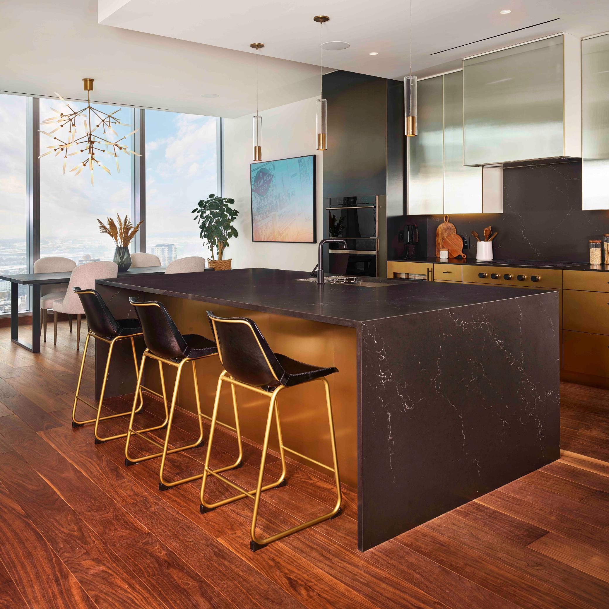 Modern Urban finish palette includes Cambria waterfall countertop, walnut wide plank flooring & trim. Photos courtesy of Cambria.