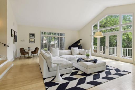 From the living room, you can access the deck, which provides a lovely transition between indoor and outdoor living, perfect for enjoying the serene surroundings.