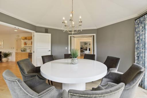 French doors lead to the adjacent kitchen for your serving ease.