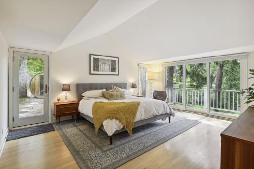 The main floor owner's suite will be your private retreat. Escape from the cares of the day while enjoying the beautiful scenery around you. There is a walk-out to a patio and sauna.