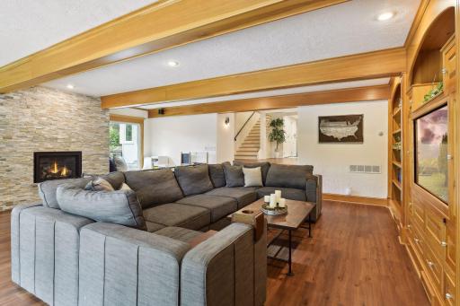 Beamed ceilings and recessed lighting add character and interest.