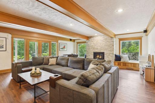 So many elements from the gas fireplace to luxury vinuyl plank flooring to the large sun-filled windows combine to create a truly relaxing environment,