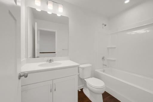 2nd bathroom with a tub/shower combo.