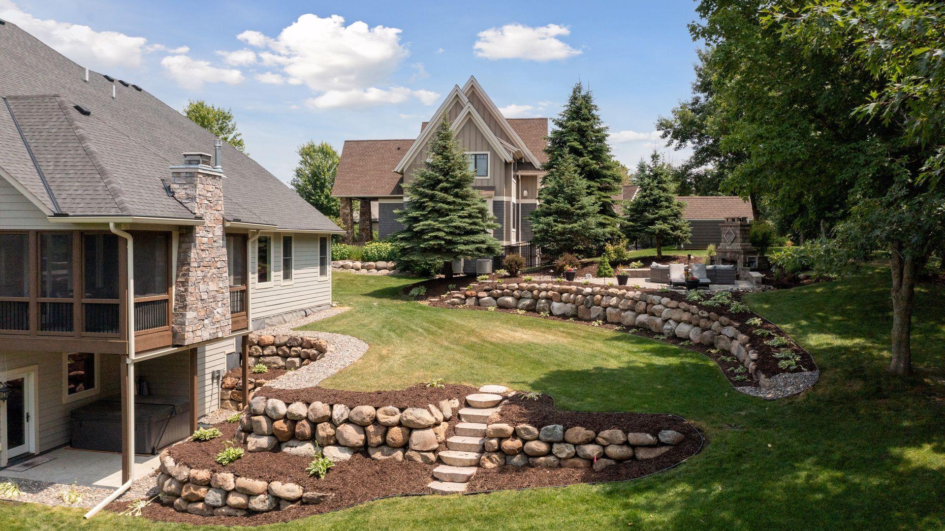 Amazing outdoor patio with real stone fireplace and patio area to entertain spring, summer, or fall.