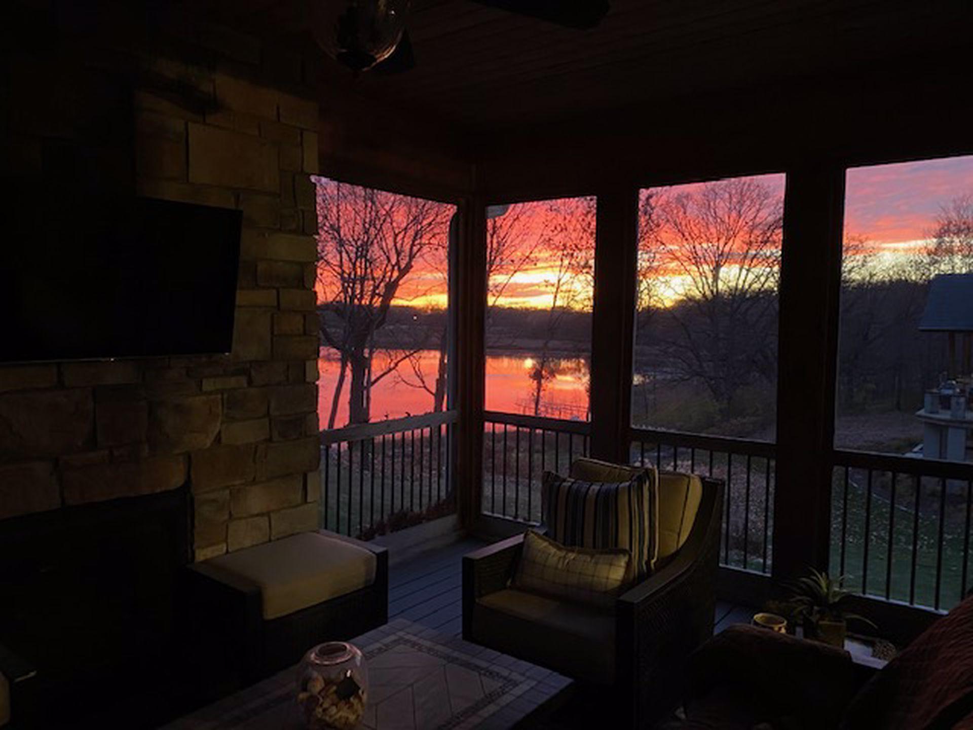 Evening sunsets from your screen porch over Lake Bavaria.