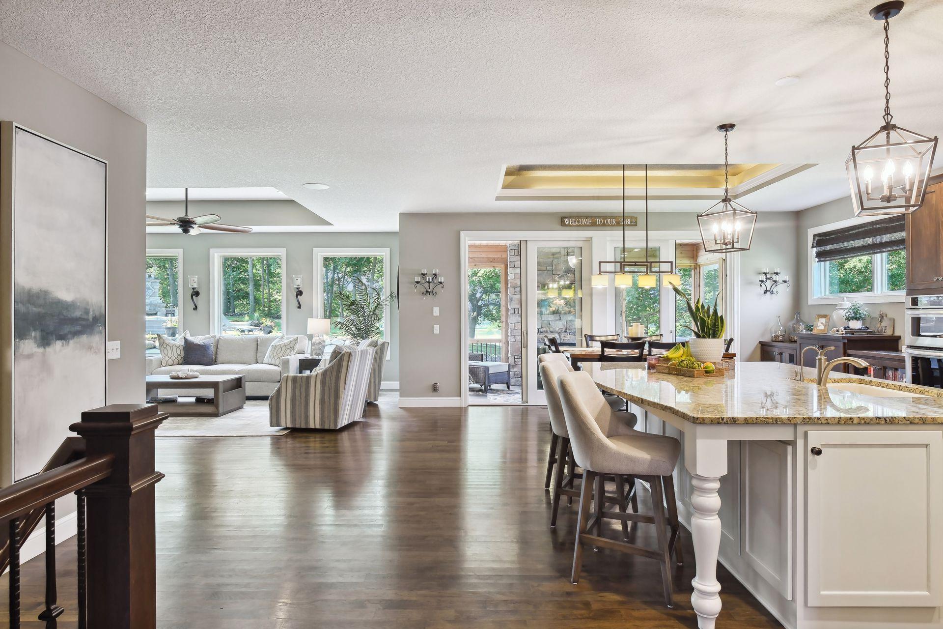 Custom built home beautiful plank wood floors and open floor plan.